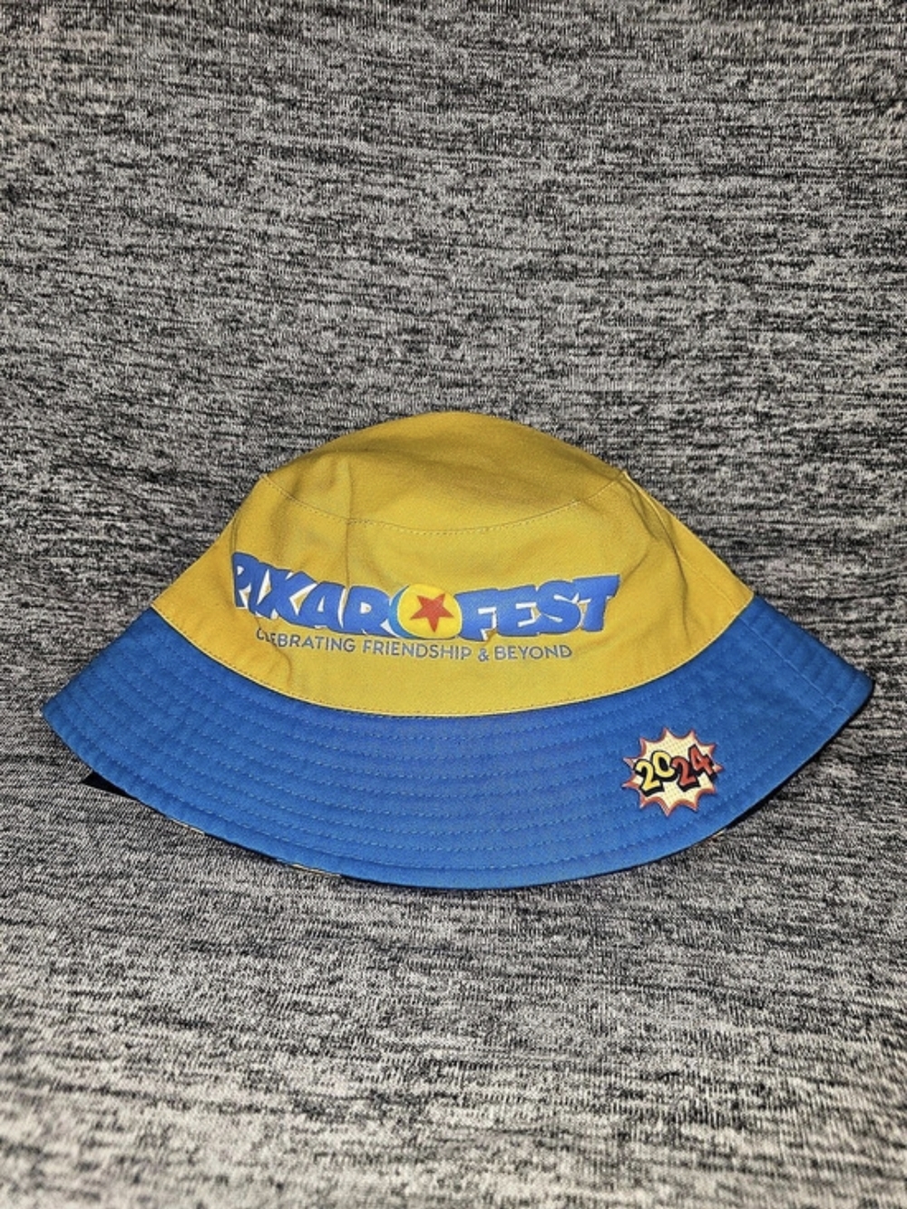 Pixar Fest Blue & Yellow Bucket Hat NWT
